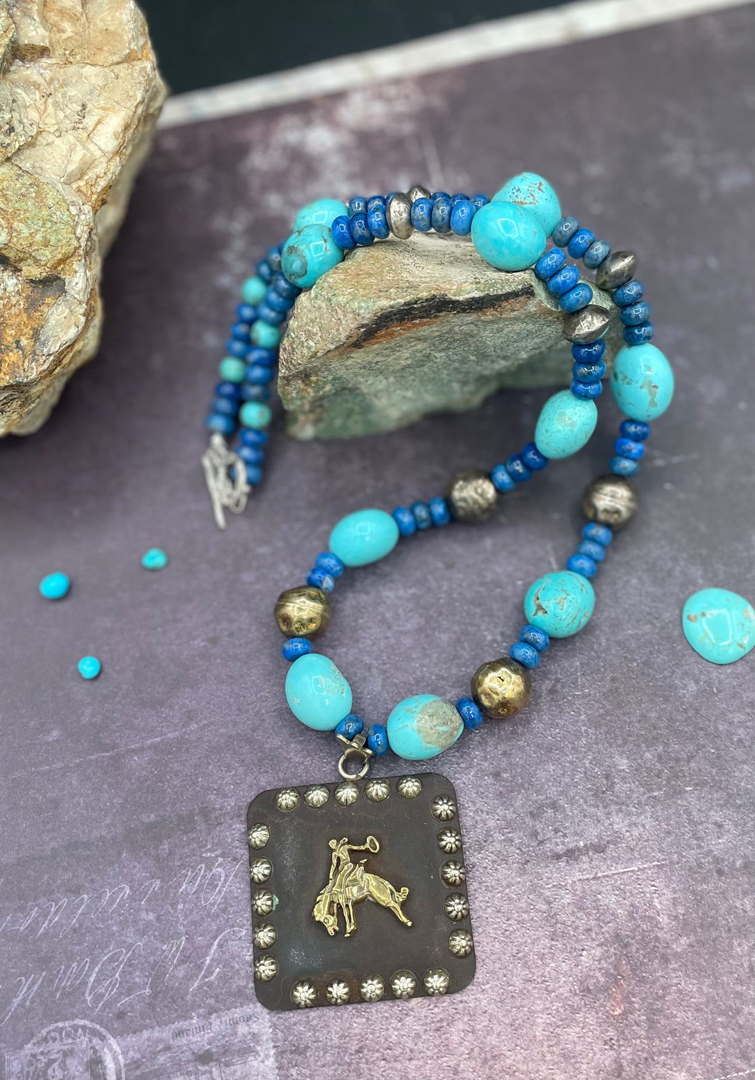 Kingman turquoise, lapis, and large concho necklace with sterling silver toggle. Available only from Rockstar Cowgirl online or in store in Cody, Wyoming.