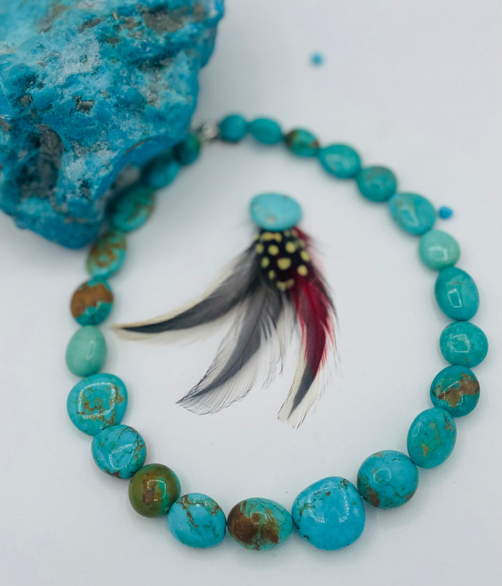 Graduated beaded necklace featuring Kingman turquoise with gold matrix in shades of blue and green. Available only from Rockstar Cowgirl online or in store in Cody, Wyoming.