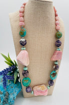Chunky necklace featuring pink Peruvian opal nuggets, Kingman turquoise, cape amethyst, amazonite, and sterling silver Navajo pearl beads. Available only from Rockstar Cowgirl online or in store in Cody, Wyoming.