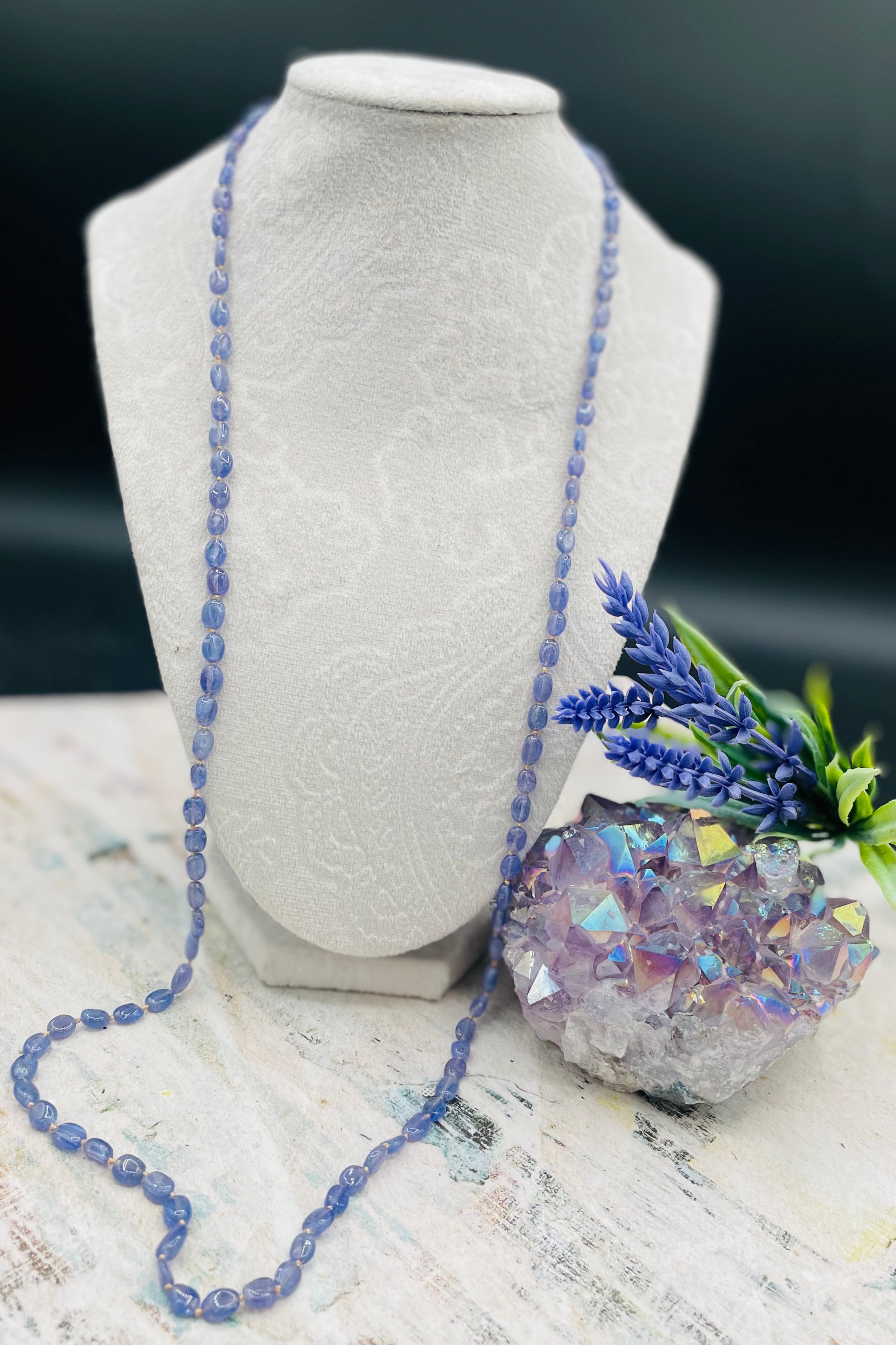 Silk knotted Tanzanite long necklace with gold silk and 14k lobster clasp. Available only from Rockstar Cowgirl online or in store in Cody, Wyoming.