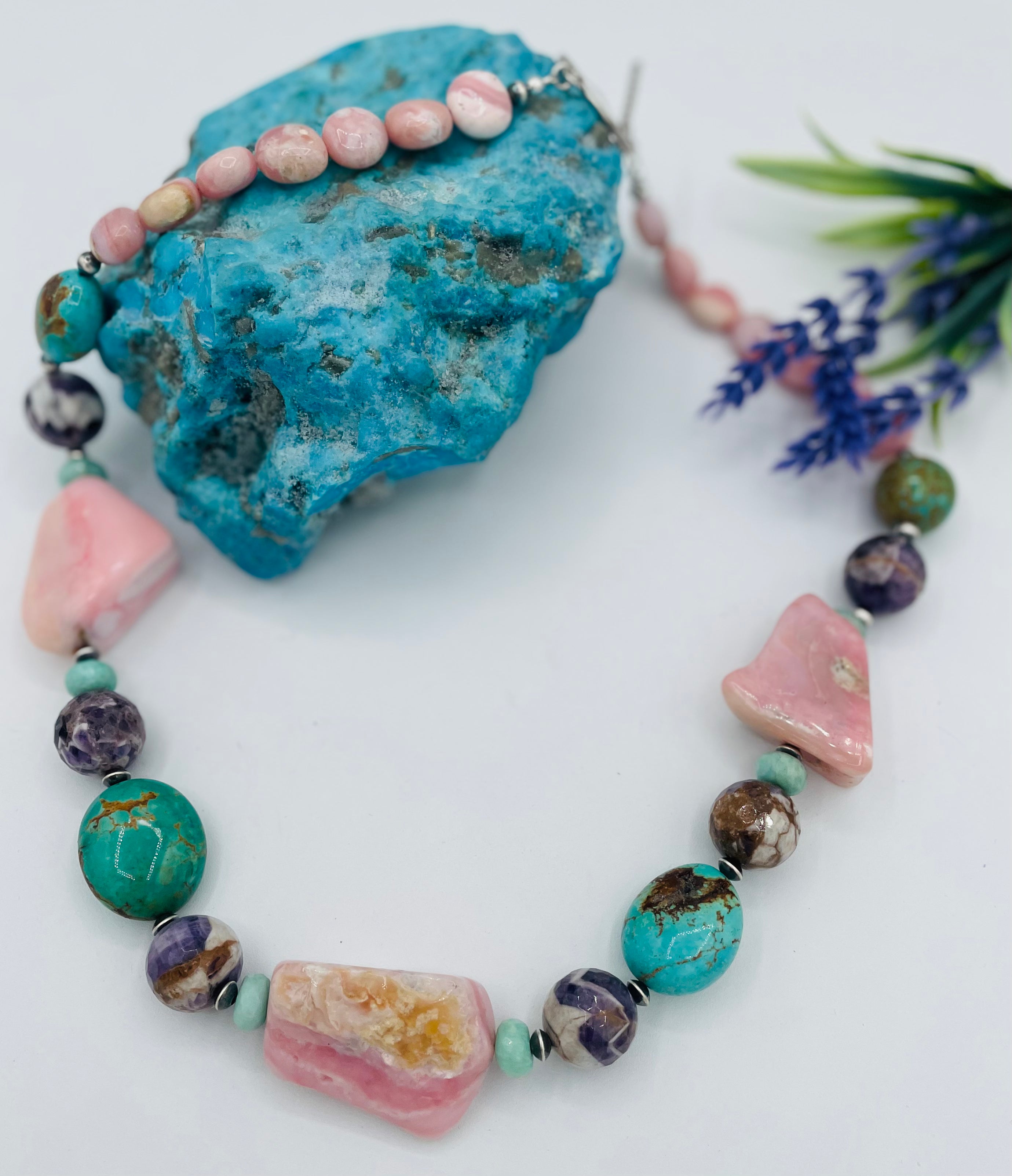 Chunky necklace featuring pink Peruvian opal nuggets, Kingman turquoise, cape amethyst, amazonite, and sterling silver Navajo pearl beads. Available only from Rockstar Cowgirl online or in store in Cody, Wyoming.