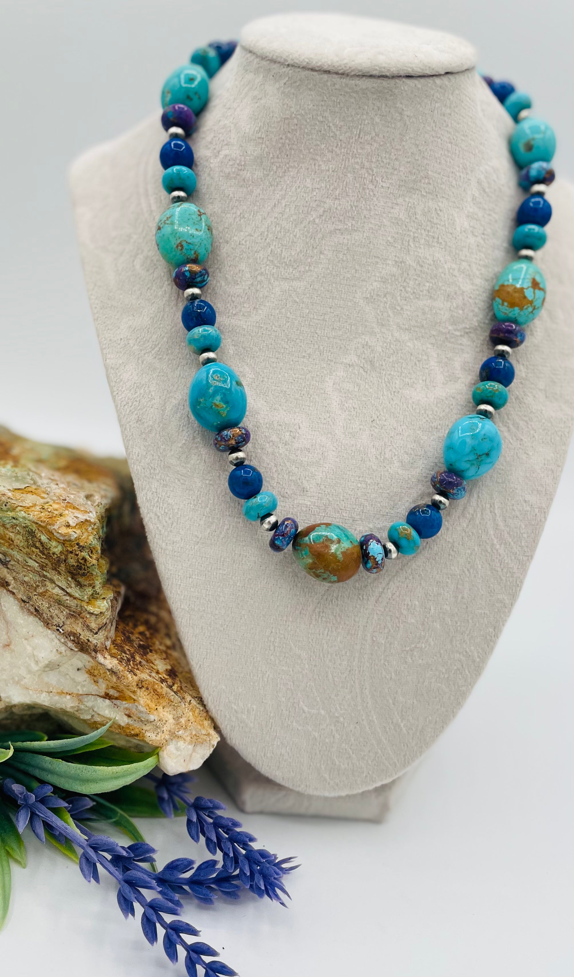 Necklace featuring Kingman turquoise with gold matrix, purple Mojave turquoise, lapis, and sterling silver Navajo pearl beads. Available only from Rockstar Cowgirl online or in store in Cody, Wyoming.