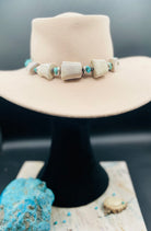 Beaded hatband with giant elk antler beads, Campitos turquoise, lapis, sterling silver, and Bali silver beads finished with leather lace and slide bead for fit. Available only from Rockstar Cowgirl online or in store in Cody, Wyoming.