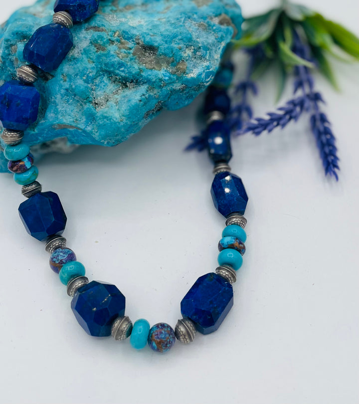 Beaded necklace featuring Lapis lazuli, royal beauty turquoise, purple Mojave turquoise, sterling silver beads and a sterling silver clasp. Available only from Rockstar Cowgirl online or in store in Cody, Wyoming.