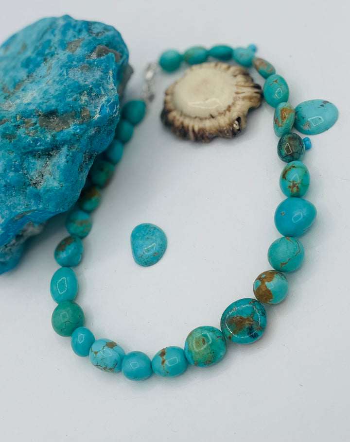 Graduated beaded necklace featuring Kingman turquoise with gold matrix in shades of blue and green. Available only from Rockstar Cowgirl online or in store in Cody, Wyoming.
