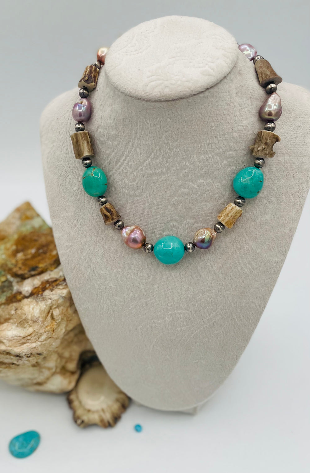 Beaded necklace featuring Kingman turquoise, natural luster pearls, deer antler, and sterling silver beads. Available only from Rockstar Cowgirl online or in store in Cody, Wyoming.
