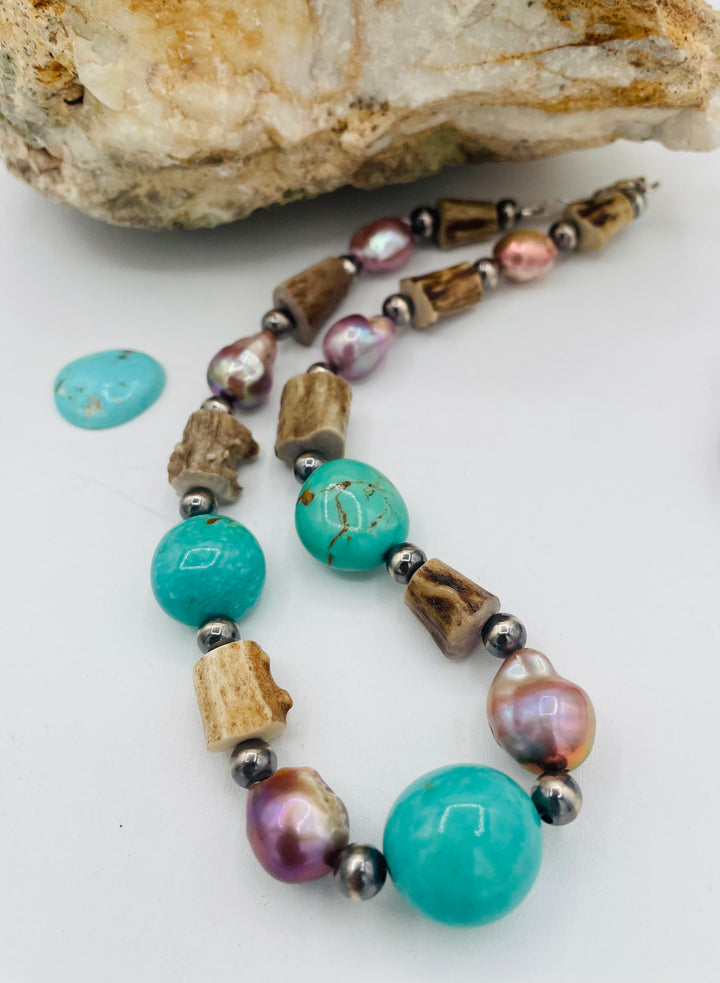 Beaded necklace featuring Kingman turquoise, natural luster pearls, deer antler, and sterling silver beads. Available only from Rockstar Cowgirl online or in store in Cody, Wyoming.