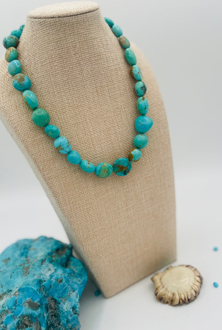 Graduated beaded necklace featuring Kingman turquoise with gold matrix in shades of blue and green. Available only from Rockstar Cowgirl online or in store in Cody, Wyoming.