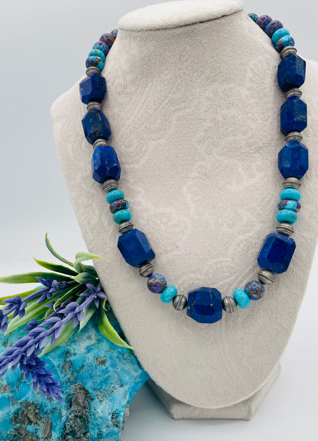 Beaded necklace featuring Lapis lazuli, royal beauty turquoise, purple Mojave turquoise, sterling silver beads and a sterling silver clasp. Available only from Rockstar Cowgirl online or in store in Cody, Wyoming.
