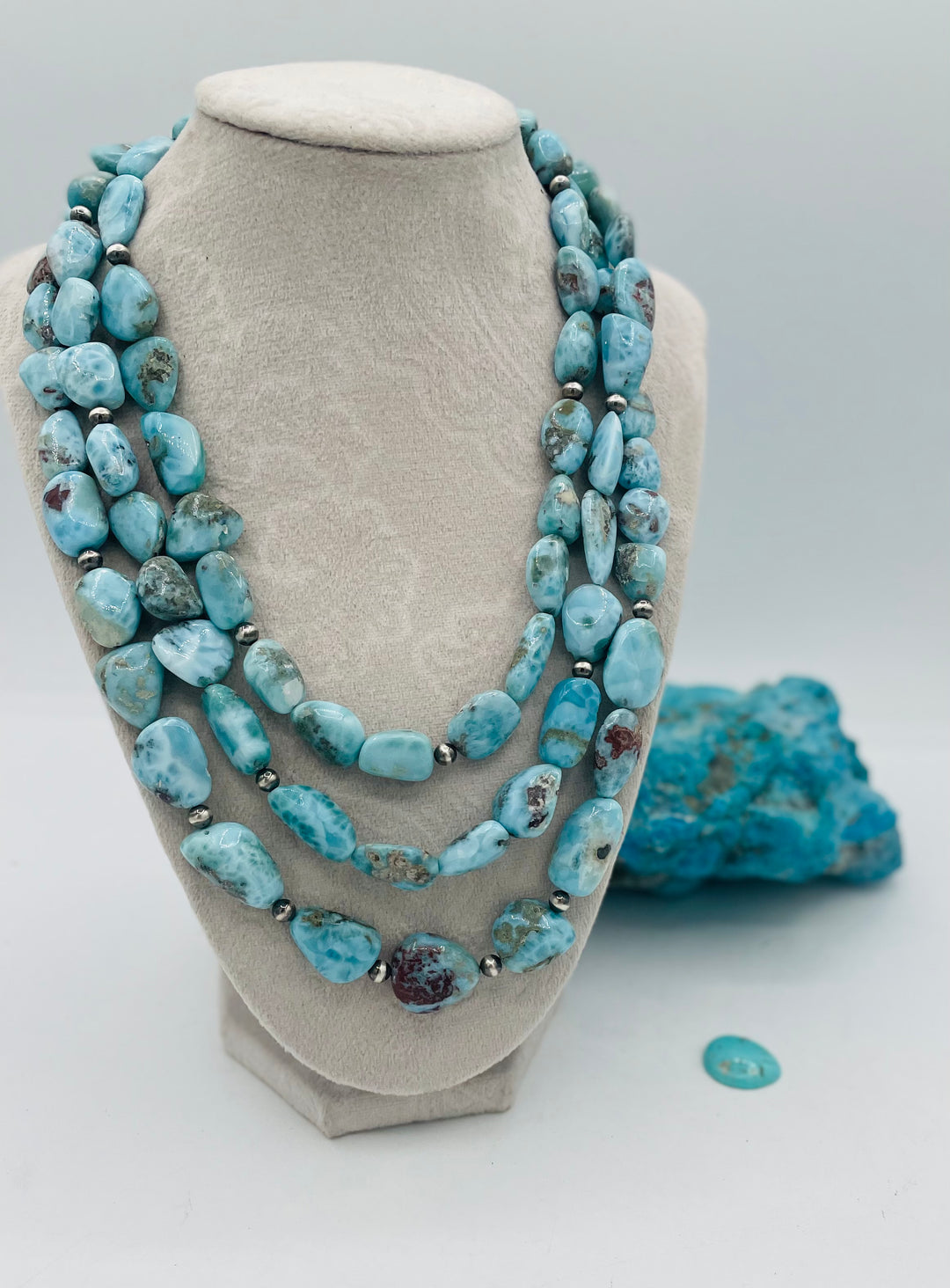 Beaded 3 strand necklace featuring smooth larimar nuggets and sterling silver beads. Available only from Rockstar Cowgirl online or in store in Cody, Wyoming.