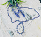 Silk knotted Tanzanite long necklace with gold silk and 14k lobster clasp. Available only from Rockstar Cowgirl online or in store in Cody, Wyoming.