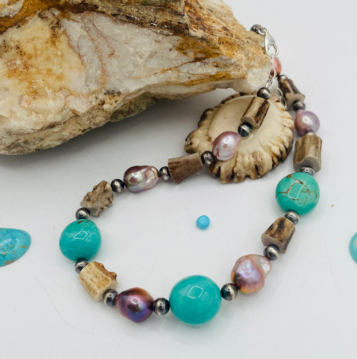 Beaded necklace featuring Kingman turquoise, natural luster pearls, deer antler, and sterling silver beads. Available only from Rockstar Cowgirl online or in store in Cody, Wyoming.