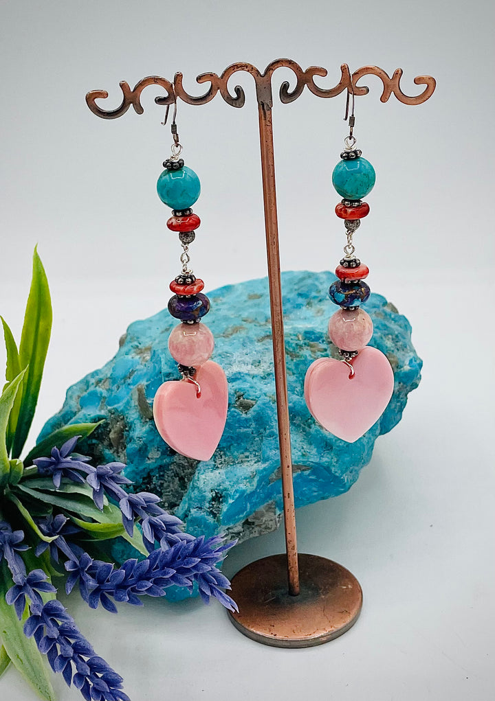 Handmade earrings featuring pink conch shell hearts, rhodochrosite, purple Mojave/ Mohave Kingman turquoise, and spiny oyster beads.  Available only from Rockstar Cowgirl online or in store in Cody, Wyoming.