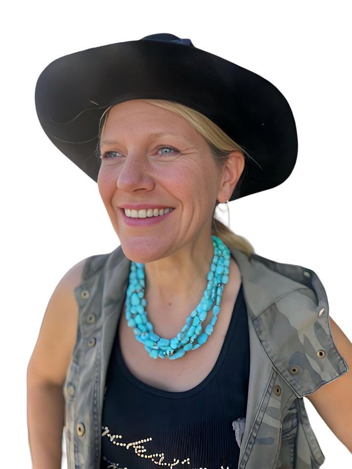 5 strand twisted torsade of 
Sonoran turquoise and sterling silver Navajo pearls with a hammered sterling silver hook clasp. Available only from Rockstar Cowgirl online or in store in Cody, Wyoming.
