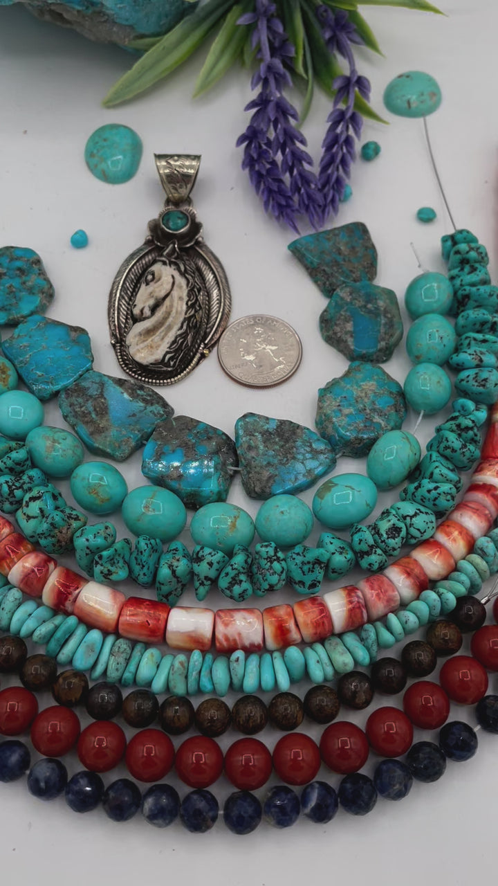 Bead box featuring Kingman turquoise, Sonoran turquoise, sodalite, spiney oyster, red jasper, bronzite, and a bone horse pendent. U.S. quarter for size reference. Available only from Rockstar Cowgirl online or in store in Cody, Wyoming